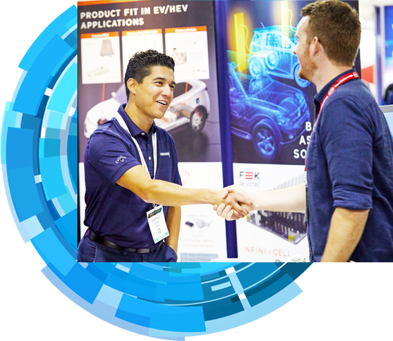 Attendee and exhibitor shaking hands at a tradeshow 