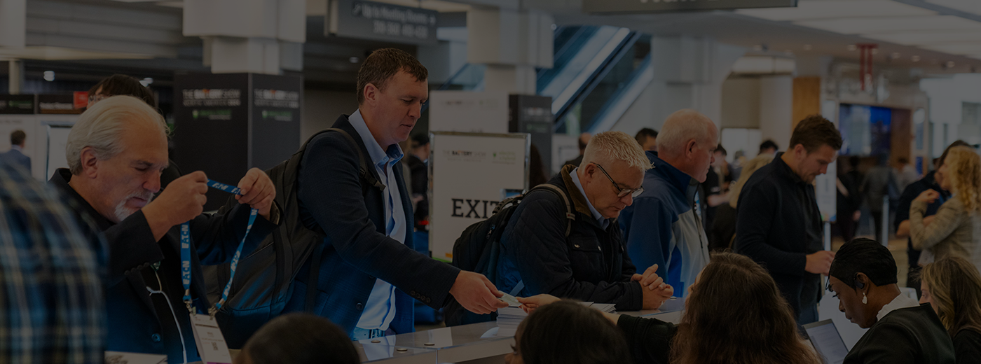 Attendees standing in line to register attending The Battery Show