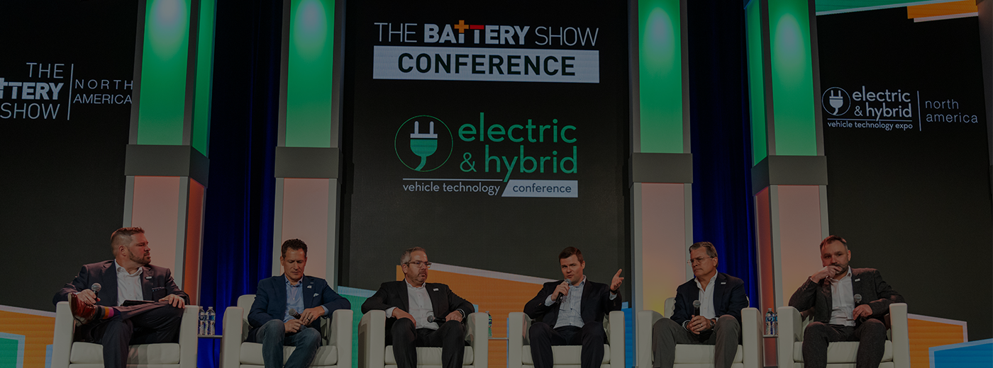 The Battery Show conference panel with industry leaders discussing innovations and challenges in electric transportation
