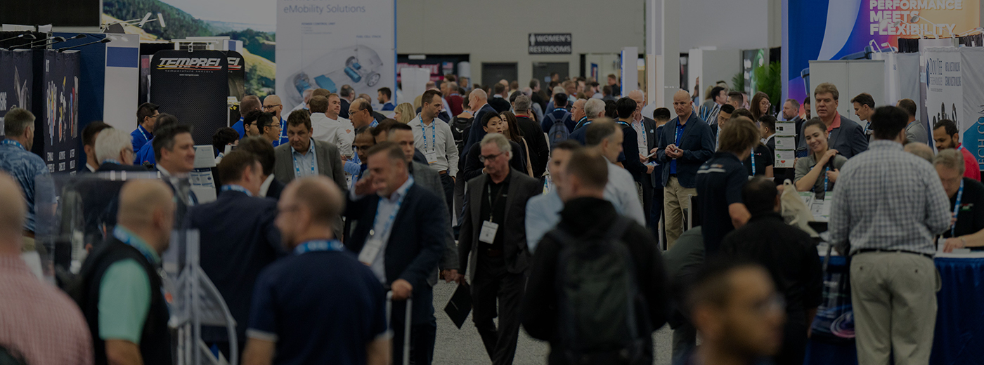 Attendees standing in line to register attending The Battery Show