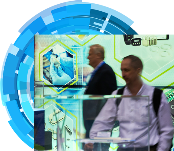 Two attendees examining products in the expo hall floor